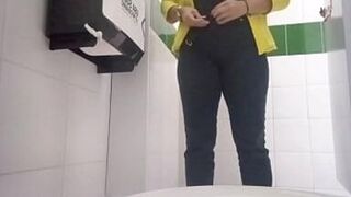 Camera in office bathroom records secretary pissing - 1 image