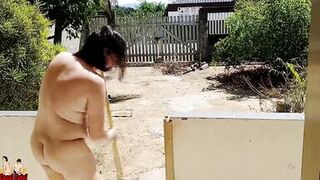 Nude housewife cleaning the balcony - 3 image