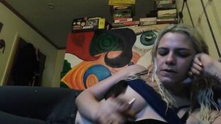 Hot blonde smokes clove cigarettes, plays on phone and plays with tits - 10 image