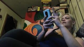 Hot blonde smokes clove cigarettes, plays on phone and plays with tits - 4 image