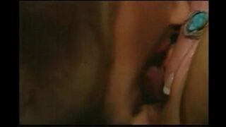 Two jail house lesbians use a double dildo - 1 image