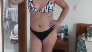 On the beach I masturbate watching as stepmom puts on a bikini to go in search of a man - 6 image